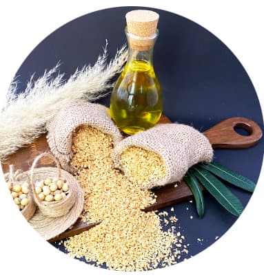 Soyno Soy Type 2 fine textured soy protein granules in burlap bags, with a bottle of soybean oil